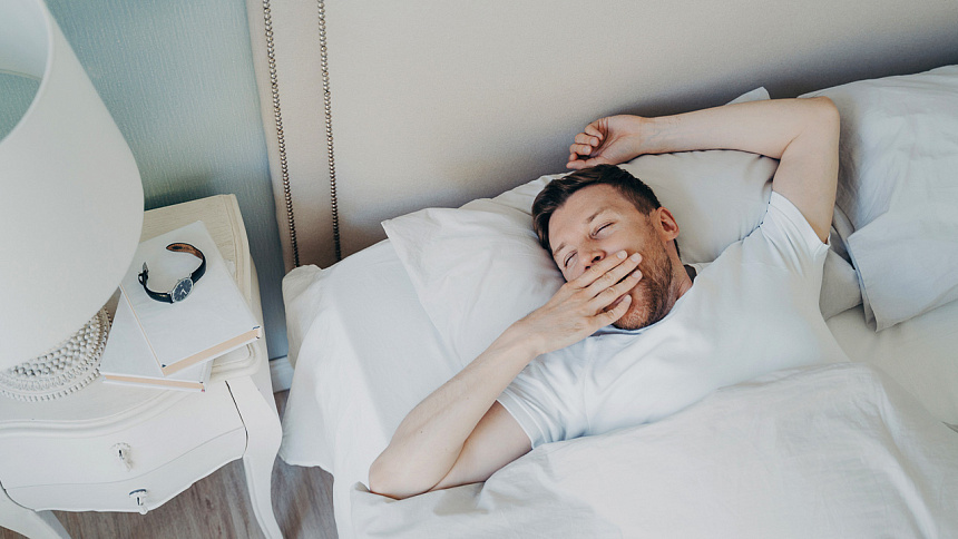 man in bed photo
